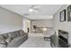 Upstairs loft area with couch, chair and tv; staircase and bedroom in view at 1016 Leatherstone Ln, Fuquay Varina, NC 27526