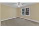 Bedroom featuring carpet, a ceiling fan, and a large window at 108 Maplewood Dr, Knightdale, NC 27545