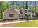 Charming two-story home with classic shutters and lush landscaping at 108 Maplewood Dr, Knightdale, NC 27545