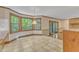 Bright kitchen nook featuring scenic windows, tile flooring, and natural light at 108 Maplewood Dr, Knightdale, NC 27545
