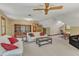 Inviting living room with bookshelves, a white sofa, and a cozy seating arrangement at 108 Maplewood Dr, Knightdale, NC 27545