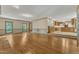 Bright living room showcasing hardwood floors, natural light, and open access to the adjacent kitchen at 108 Maplewood Dr, Knightdale, NC 27545