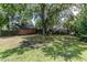 Large backyard with ample space, shade trees, and privacy fencing at 1106 Sycamore St, Rocky Mount, NC 27801