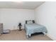 Bedroom with a single bed, side table and cool color scheme at 1106 Sycamore St, Rocky Mount, NC 27801