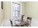 Breakfast nook with table, chairs, and natural light from a window at 1106 Sycamore St, Rocky Mount, NC 27801