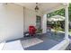 Cozy covered porch with outdoor chairs at 1106 Sycamore St, Rocky Mount, NC 27801