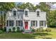 Charming two-story brick home with a bright red front door and neatly landscaped front yard at 1106 Sycamore St, Rocky Mount, NC 27801