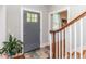 Welcoming foyer with hardwood floors, a staircase, and natural light at 1106 Sycamore St, Rocky Mount, NC 27801