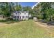Two-story home with well-manicured lawn and brick facade at 1106 Sycamore St, Rocky Mount, NC 27801