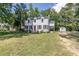 Two-story home with well-manicured lawn and brick facade at 1106 Sycamore St, Rocky Mount, NC 27801