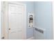 Hallway with a built-in niche holding a vintage rotary telephone on the wall at 1106 Sycamore St, Rocky Mount, NC 27801
