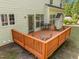 Spacious back deck is great for outdoor seating and overlooks a serene backyard at 112 Natchez Ct, Cary, NC 27519