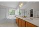 Bathroom with a garden tub, glass shower, double windows and a double sink vanity at 112 Natchez Ct, Cary, NC 27519