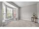 Bright bedroom with neutral colors, bay window, and modern decor at 112 Natchez Ct, Cary, NC 27519