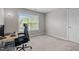 A versatile room with a desk, chair, and bright window, perfect for an office at 112 Natchez Ct, Cary, NC 27519