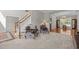 Open living room featuring a staircase and traditional furnishings at 112 Natchez Ct, Cary, NC 27519