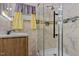 Bathroom with a glass enclosed shower and neutral toned walls at 119 Johnson St, Broadway, NC 27505