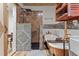 Luxurious bathroom featuring a clawfoot tub, stone shower, and unique fixtures, creating a spa-like experience at 119 Johnson St, Broadway, NC 27505