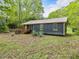 Quaint one-level home with a front porch and well-maintained lawn at 1204 Hydrangea Ct, Hillsborough, NC 27278