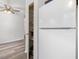 Kitchen area next to pantry featuring stainless steel refrigerator at 1204 Hydrangea Ct, Hillsborough, NC 27278