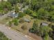 Overhead view displays the home's position on a generous lot with a blend of trees and open spaces at 1213 Walnut St, Cary, NC 27511