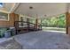 Covered carport featuring a ramp and access to the home's entrance for convenience and accessibility at 1213 Walnut St, Cary, NC 27511