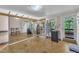 Versatile room with large mirrors and bright lighting at 1213 Walnut St, Cary, NC 27511