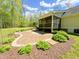 Backyard featuring patio and landscaping at 122 American Rd, Timberlake, NC 27583