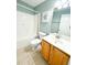 Bathroom featuring a shower over tub, a toilet, and a vanity sink at 122 American Rd, Timberlake, NC 27583
