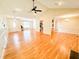 Expansive living room with hardwood floors, open layout to the kitchen, and vaulted ceilings at 122 American Rd, Timberlake, NC 27583