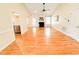 Bright living room boasts gleaming hardwood floors, fireplace and open floor plan to the kitchen at 122 American Rd, Timberlake, NC 27583