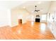 Spacious living room featuring gleaming hardwood floors, a fireplace, and an open floor plan at 122 American Rd, Timberlake, NC 27583