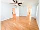 Large main bedroom with ceiling fan and an ensuite bath and walk-in closet at 122 American Rd, Timberlake, NC 27583