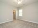 Bedroom with ceiling fan, carpet floors, and a closet at 125 Claymore Dr, Clayton, NC 27527