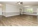 Large living room area featuring hardwood flooring and high ceilings at 125 Claymore Dr, Clayton, NC 27527