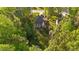 Aerial view of a charming home with a spacious backyard, perfect for outdoor entertaining at 128 Waterleaf Pl, Clayton, NC 27527
