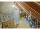 Unfinished attic storage space, with exposed beams, vapor barrier, and some boxes at 128 Waterleaf Pl, Clayton, NC 27527