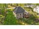 Beautiful backyard view with a wooden deck, complemented by lush greenery and a serene atmosphere at 128 Waterleaf Pl, Clayton, NC 27527
