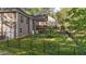 Spacious backyard with a dark metal fence, providing security and privacy at 128 Waterleaf Pl, Clayton, NC 27527