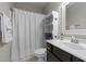 Bathroom featuring a combination tub/shower and a white vanity sink at 128 Waterleaf Pl, Clayton, NC 27527