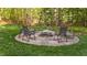 Outdoor fire pit area perfect for relaxing evenings with friends and Gathering in a wooded setting at 128 Waterleaf Pl, Clayton, NC 27527