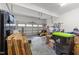 Spacious garage with overhead door, ideal for parking and storage with lots of natural light at 128 Waterleaf Pl, Clayton, NC 27527