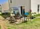 Backyard patio area, perfect for outdoor relaxation and entertaining guests at 135 Shallow Dr, Youngsville, NC 27596
