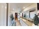 Modern bathroom with a double vanity, granite countertop, glass shower and walk-in closet at 135 Shallow Dr, Youngsville, NC 27596