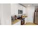 Modern kitchen with stainless steel appliances, granite countertops, and ample cabinet space at 135 Shallow Dr, Youngsville, NC 27596