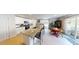 Open kitchen featuring granite countertops and stainless steel appliances at 135 Shallow Dr, Youngsville, NC 27596