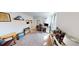 Spacious home office featuring natural light and ample space for work and relaxation at 135 Shallow Dr, Youngsville, NC 27596