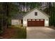 A beautiful exterior shot of a house with a garage and driveway taken during dusk at 1368 Ohio Ln, Sanford, NC 27332