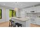 Kitchen featuring an island with stone countertops and stainless steel appliances at 1368 Ohio Ln, Sanford, NC 27332