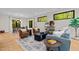 Inviting living area filled with natural light, complemented by contemporary decor and comfortable seating arrangement at 1368 Ohio Ln, Sanford, NC 27332